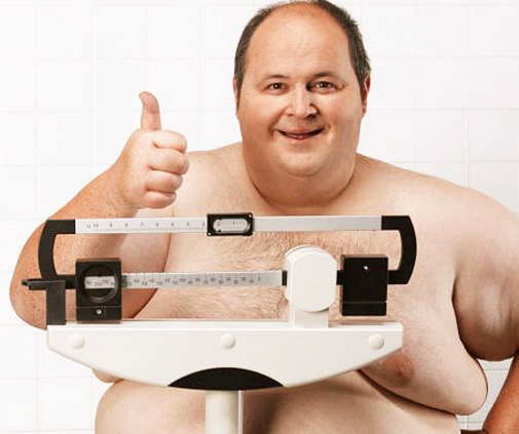 Толстый человек на весах