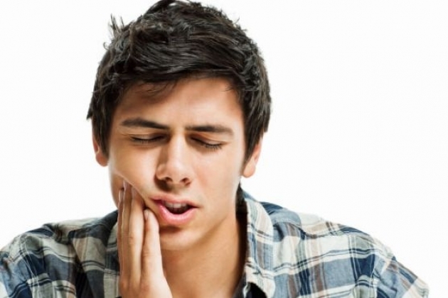 Почему болит зуб под пломбой