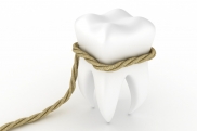 Почему болит зуб после удаления?